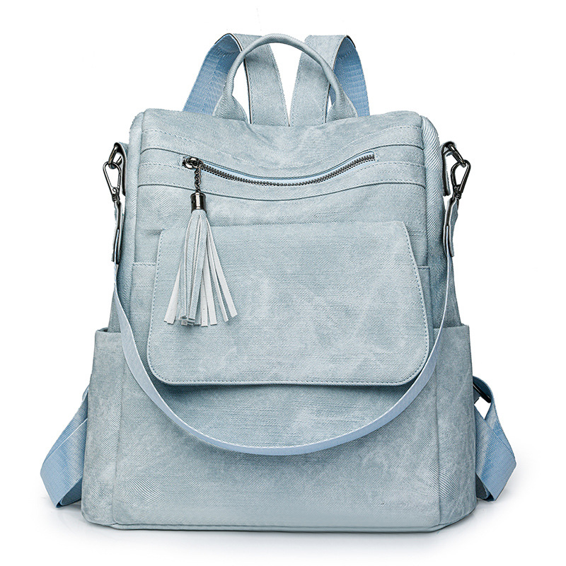 Nuevo estilo mochila mujer 2024 de gran capacidad retro moda borla bandolera viaje de ocio mochila ligera al por mayor