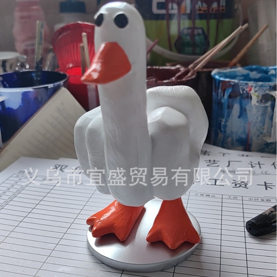기초가있는 오리 가운데 손가락 자석 장식품