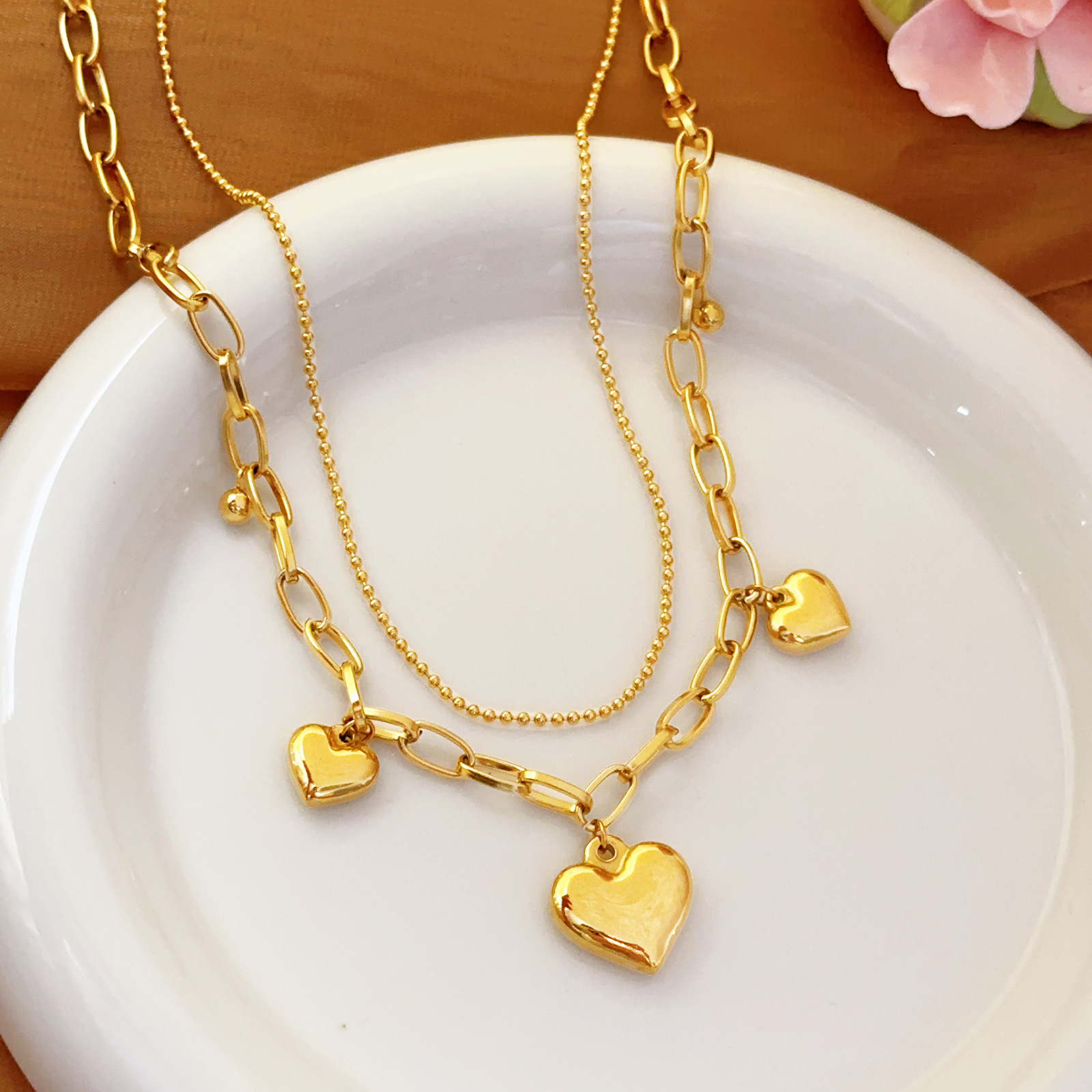 Colgante de corazón de melocotón de acero inoxidable transfronterizo europeo y americano Cadena irregular Pulsera de industria pesada chapada en oro Amor dorado Nuevo estilo