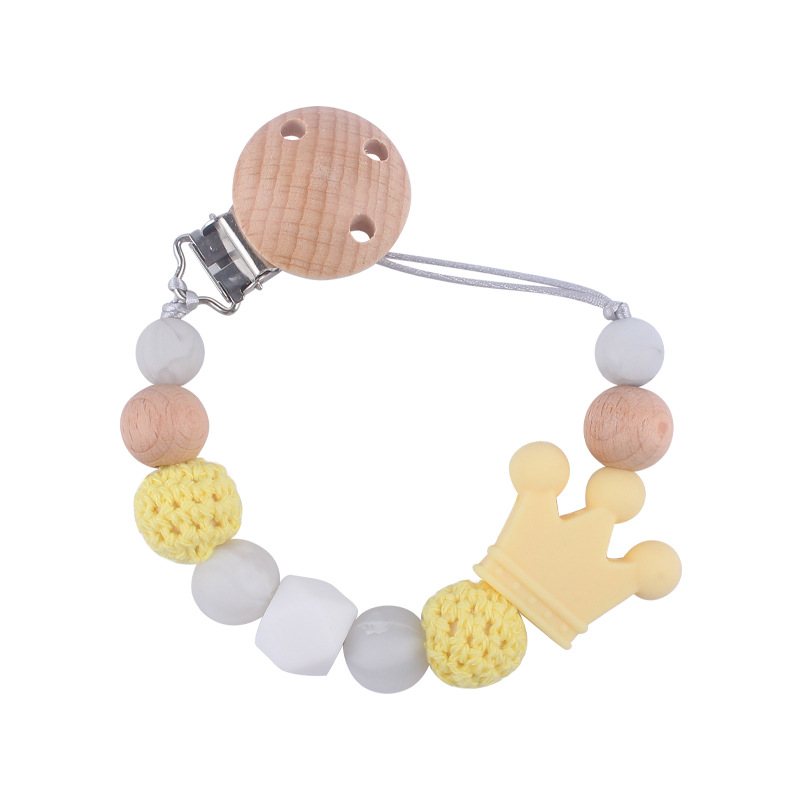 Suministros para bebés calmante clip de chupete de haya bebé anti-caída de la cadena de dibujos animados corona de silicona perlas mordedura molar chupete cadena