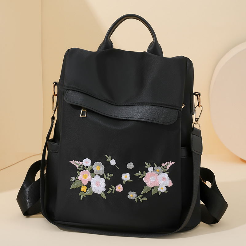 2024 nueva mochila antirrobo bordada para mujer estilo étnico moda flor ocio mochila de viaje de un solo hombro de doble uso