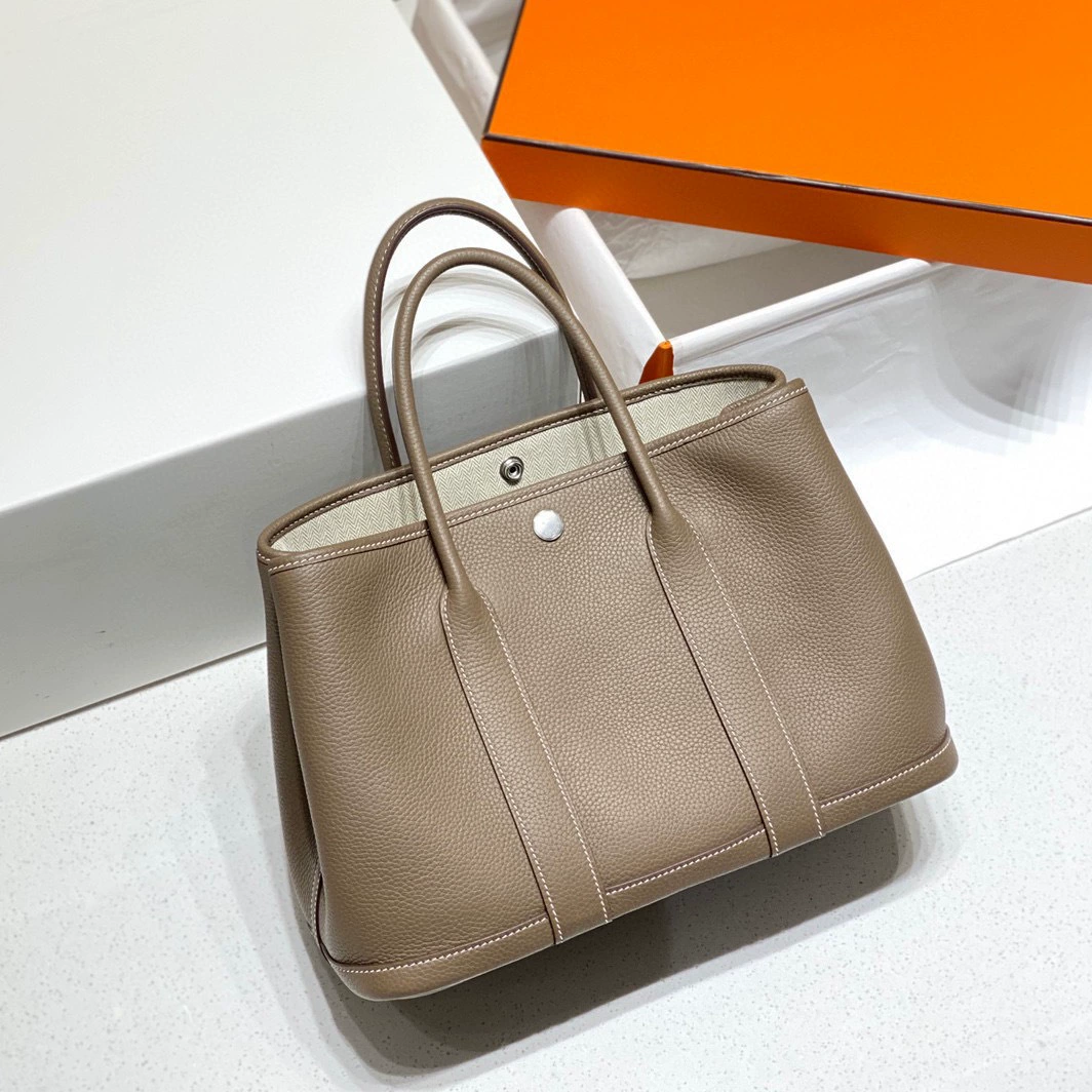 Handheld fashionable leather capacious shopping bag
