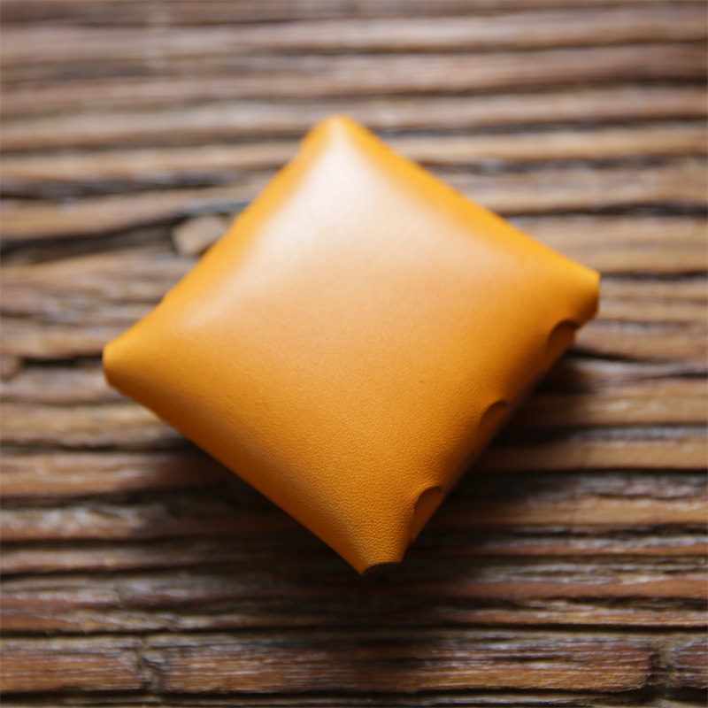 男女のミニ小銭入れは、トップの牛革をなめして、硬貨を掛けて、本革のイヤホンの保護カバーをしています。