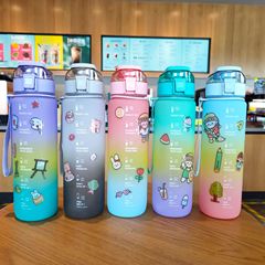 Wholesale trendy new gradient matte straws in plastic water bottles—portable design with a carry handle, plus 2D stickers included! Available in a generous 1000ml capacity.