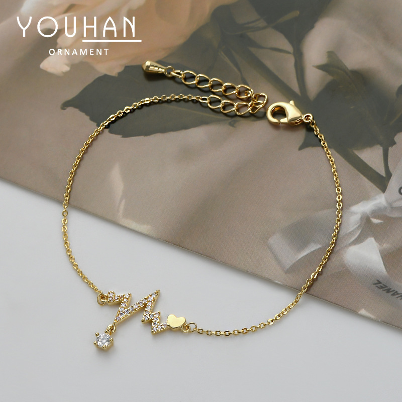 Real Gold plating micro inlaid zircon temperament hand jewelry female niche design beating heart heartbeat bracelet wholesale