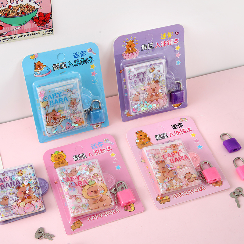 Capu conejillo de indias mini en el aceite con bloqueo conjunto de estudiantes despresionar en el aceite pellizco pellizco cuaderno de línea horizontal