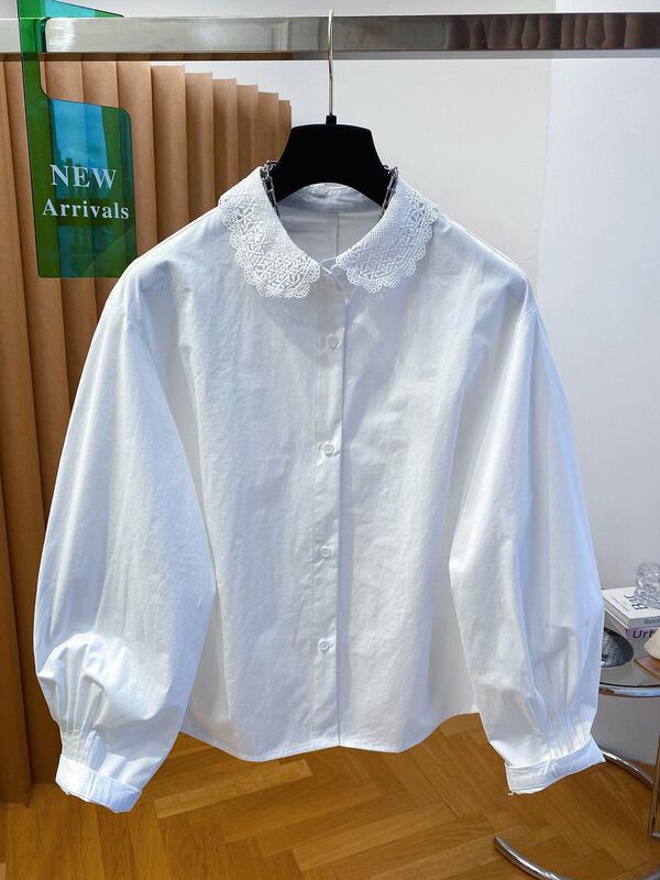 Sexy lace-trimmed white long-sleeve women's shirt, 2026 new style, loose and extremely beautiful top for spring Sexy lace-trimmed white long-sleeve women's shirt, 2026 new style, loose and extremely beautiful top for spring