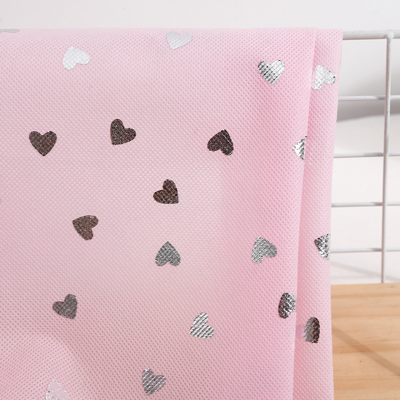 丙纶星星无纺烫金布 厂家现货 聚乙烯包装衬衫家具无纺布面料