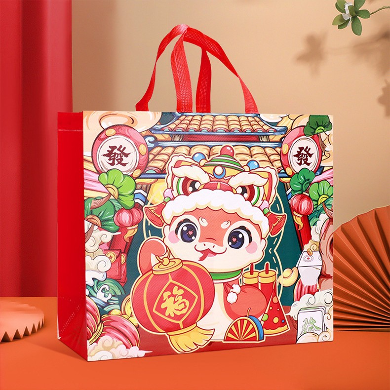 Huimei 25 años nueva bolsa de regalo no tejida para el año de la serpiente, bolsa de bendición, regalo portátil, bolso laminado rojo