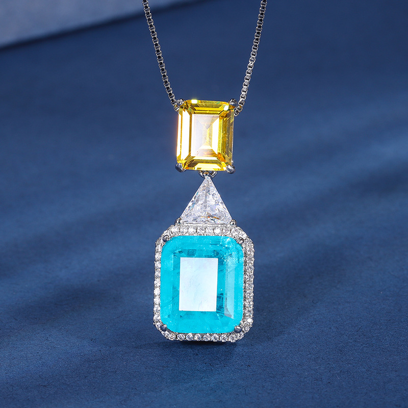 Zhuang sheng joyas de cobre inferior chapado en oro de simulación de moda esmeralda palaiba de dos colores de piedra principal traje de temperamento de las mujeres