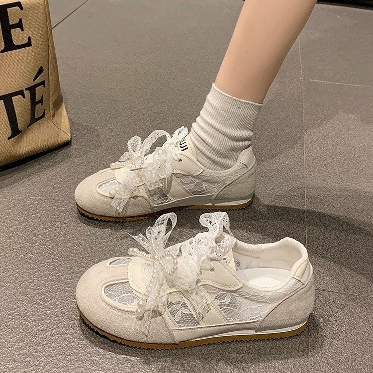 2026 verano nuevo nicho plano zapatos de entrenamiento de la red versátil transpirable zapatos deportivos casuales encaje Gump zapatos mujeres