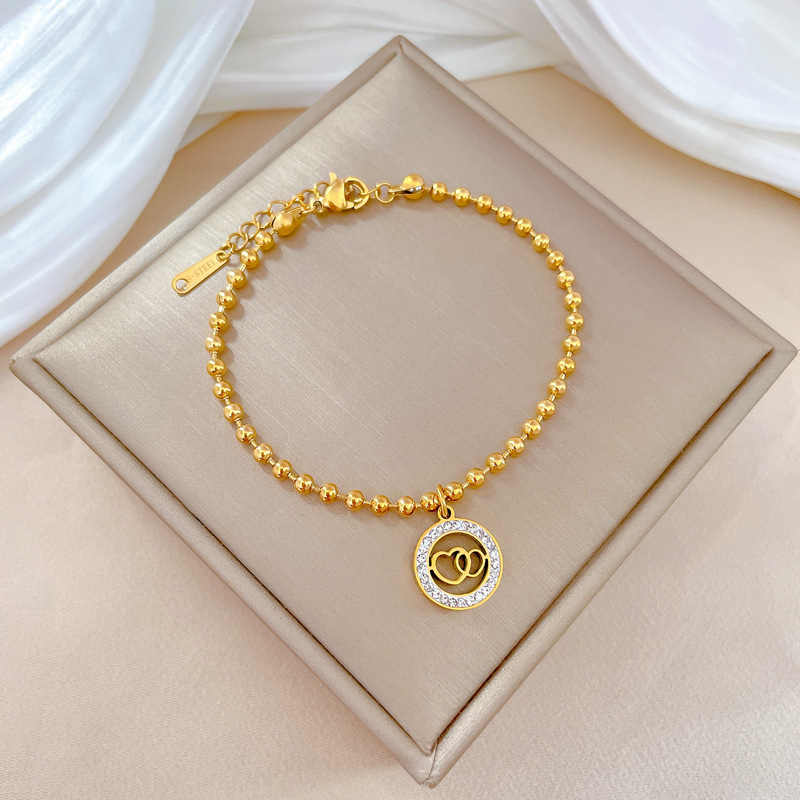 Bracciale doppio anello con perline per donna_voghion.com