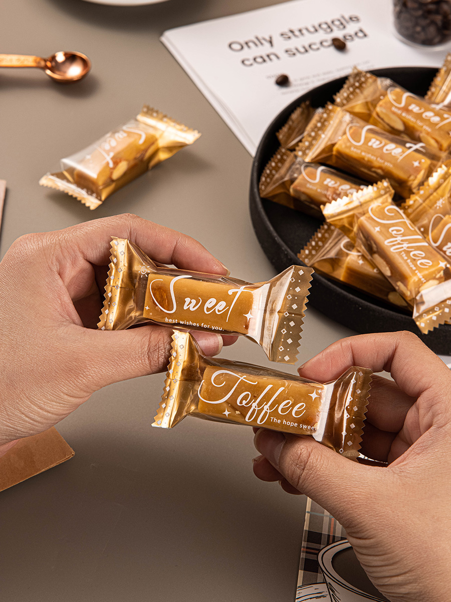 Nueva bolsa de embalaje transparente simple de caramelo de toffee nougat bolsas de sello de máquina de azúcar de café bolsas de sello de nieve crisp bolsas de sello independientes