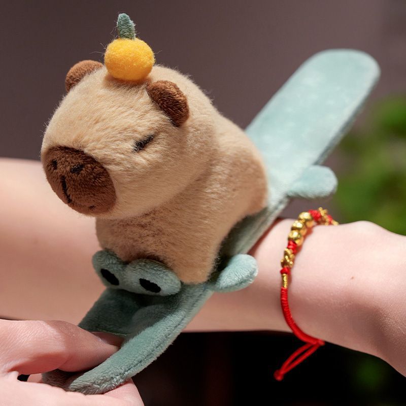 カピバラのパチパチの創意的な手環のかわいい動物のぬいぐるみの人形のおもちゃの卸売りは萌えます。