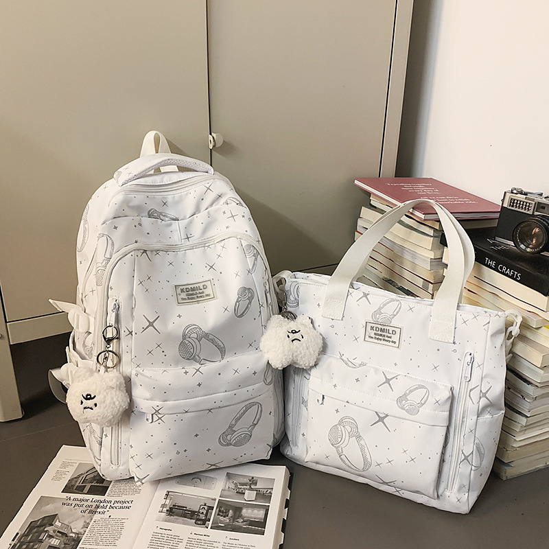 Cross-border 2026 nicho universal estrellas auriculares mochila de gran capacidad mochila de graffiti de viaje de estudiantes universitarios