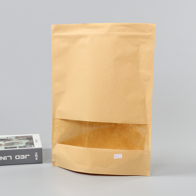 Spot bolsa de papel kraft con ventana transparente bolsa de embalaje de alimentos autosellada autoportante bolsa de té sellada de ocho lados fácil de rasgar
