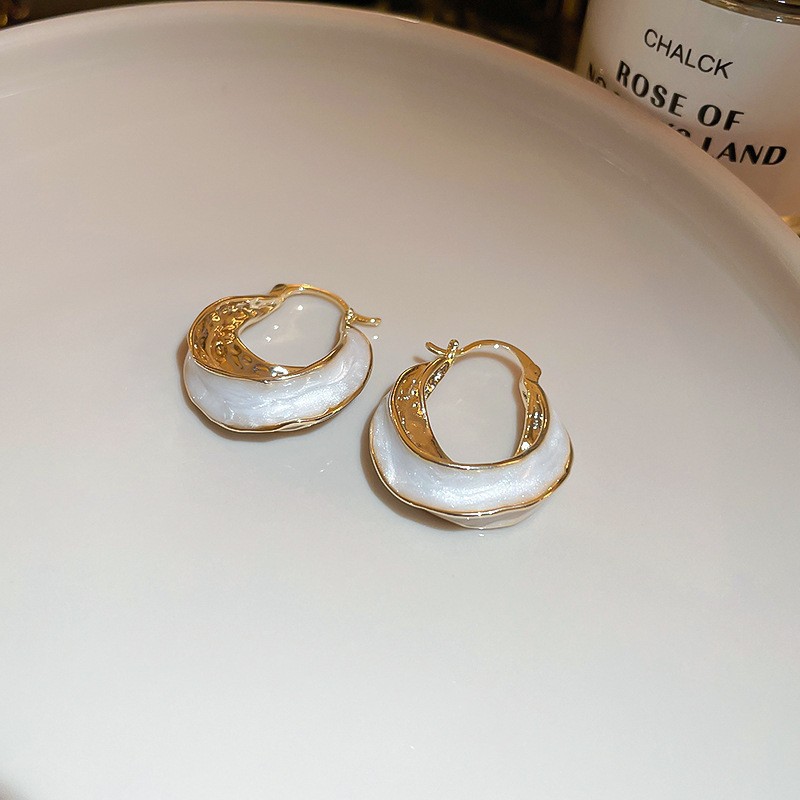 Aguja de plata flor pendientes geométricos pendientes dulces pequeños frescos de Corea del Sur ins moda nicho pendientes