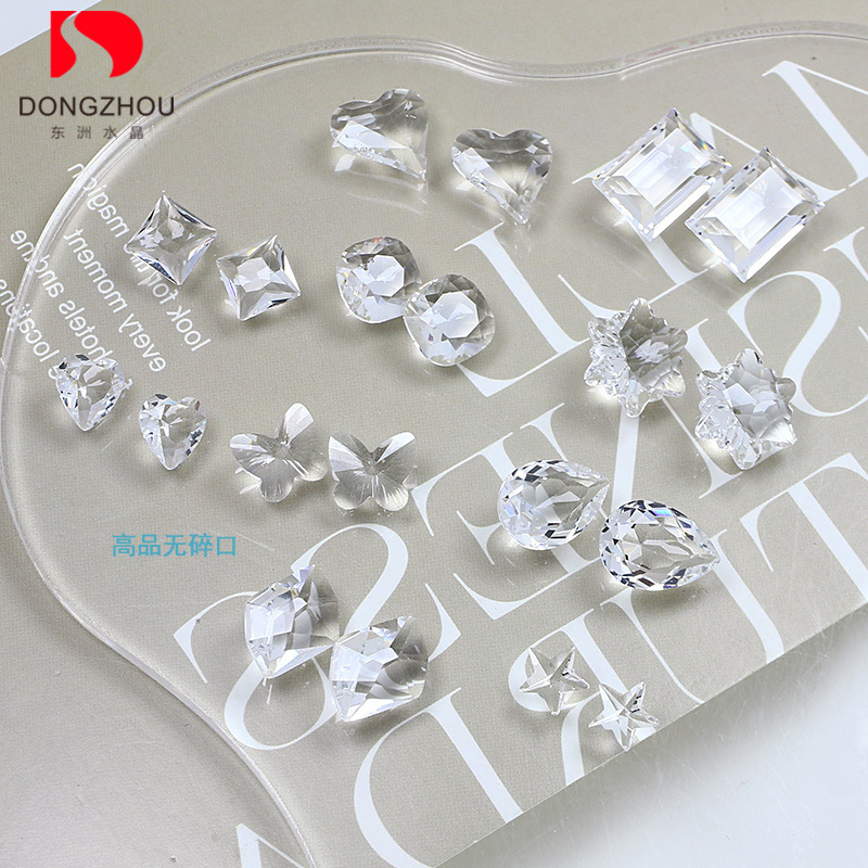东洲透明白美甲钻鸽子蛋蝴蝶冰川白K9玻璃歪心裸钻冰糖透美甲饰品