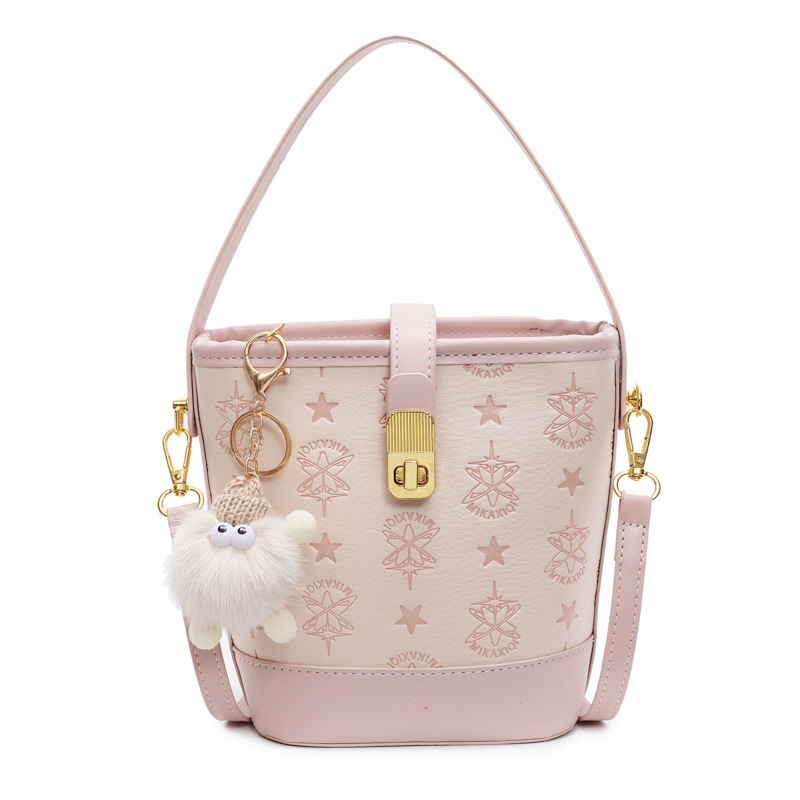 Super caliente bolso de cubo de mano mujer 2025 nueva moda relieve bolso de hombro de alta calidad humedad versátil bolso de mochila