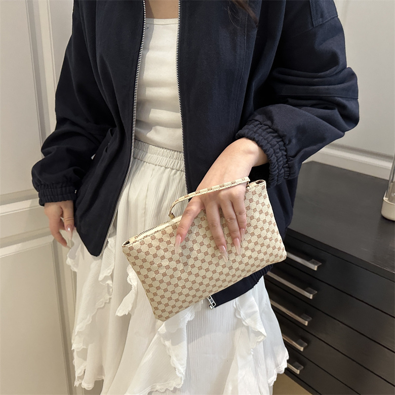 Impresión cuadrada otoño e invierno bolsas de mano casuales universales para mujeres de alta calidad temperamento simple nicho de moda bolsas de cena