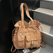 尼龙抽绳束口大容量单肩包简约多口袋学生书包休闲百搭手提包女