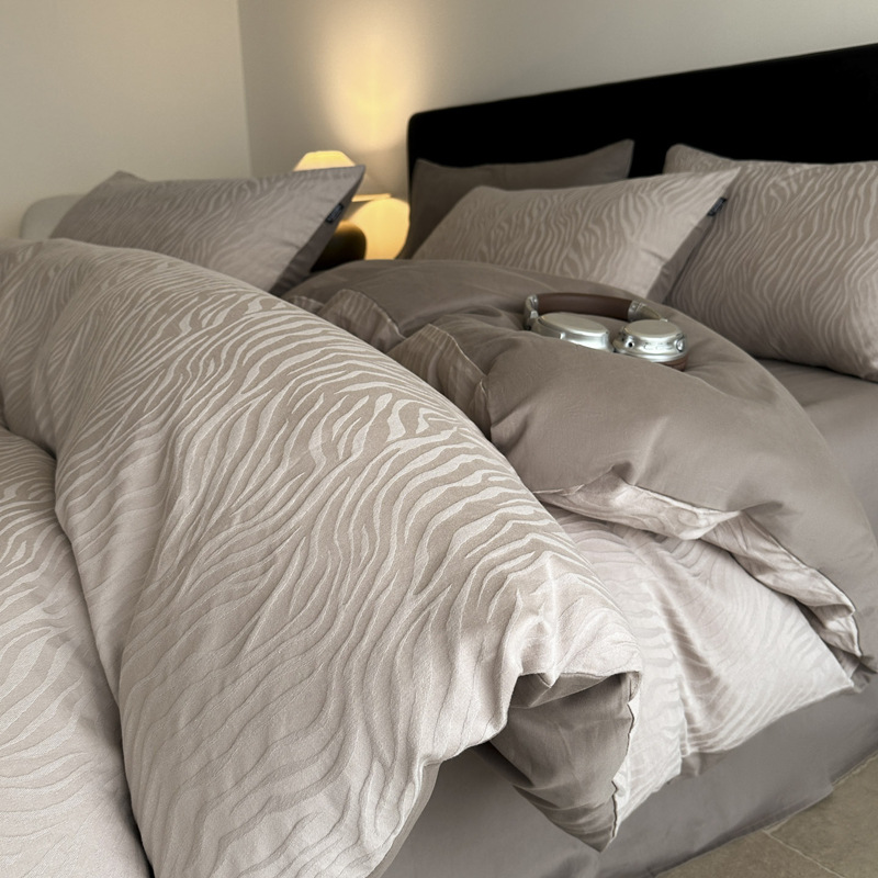 Cama de algodón de lana larga de Xinjiang de clase A de grado materno y infantil, cuatro piezas, 100% algodón único, 60 s, algodón teñido Jacquard, cubierta