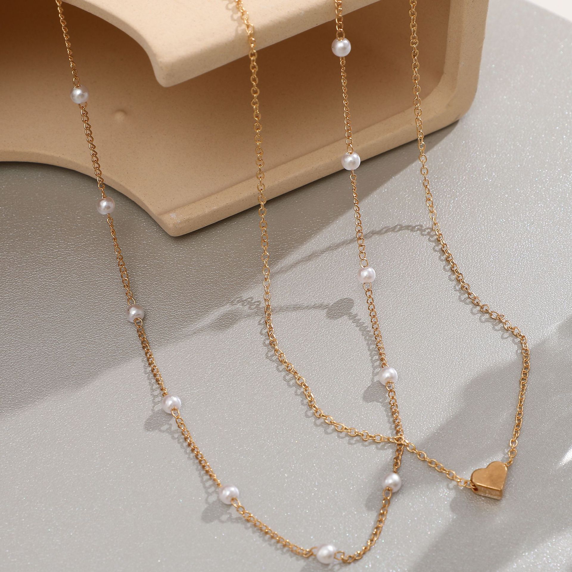 hot selling double-layer necklace creative simple street shooting necklace copper peach heart Pearl multi-layer cla_voghion.com