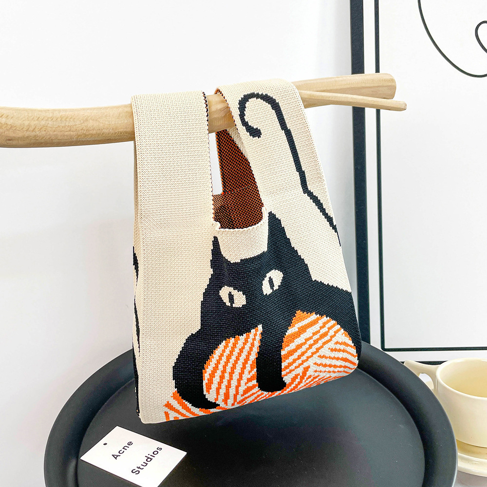 Nuevo bolso de punto para teléfono para mujer, bolso tejido suave en colores dopamina, bolso de mano con forma de corazón en estilo coreano con bloques de color.