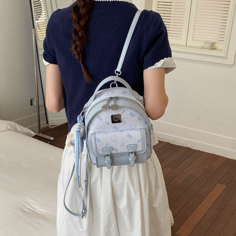 Moda extranjera estilo coreano simple sensación diaria 2026 nuevo hombro mochila bolsa de cubo portátil temperamento casual