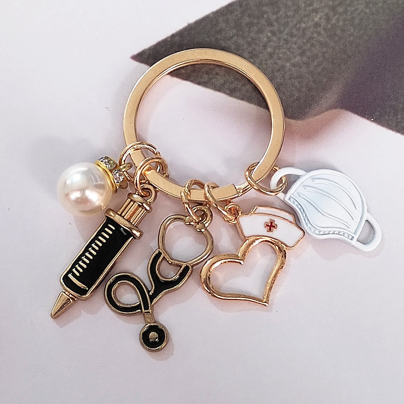 Llavero médico nuevo transfronterizo enfermera doctor jeringa estetoscopio personal