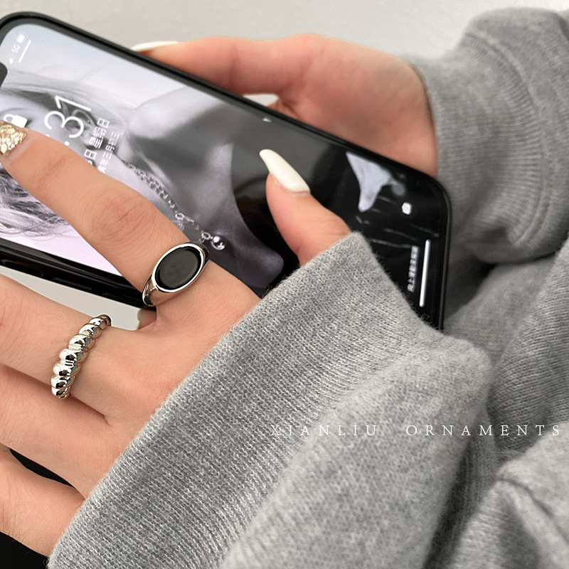 Retro black small design fashionable ring with pigtail