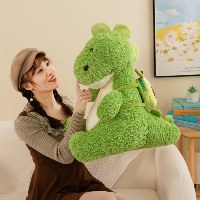 Nuevo aguacate mochila dinosaurio juguetes de peluche muñecas chicas regalo juguetes para niños muñecas de dibujos animados máquina de muñecas