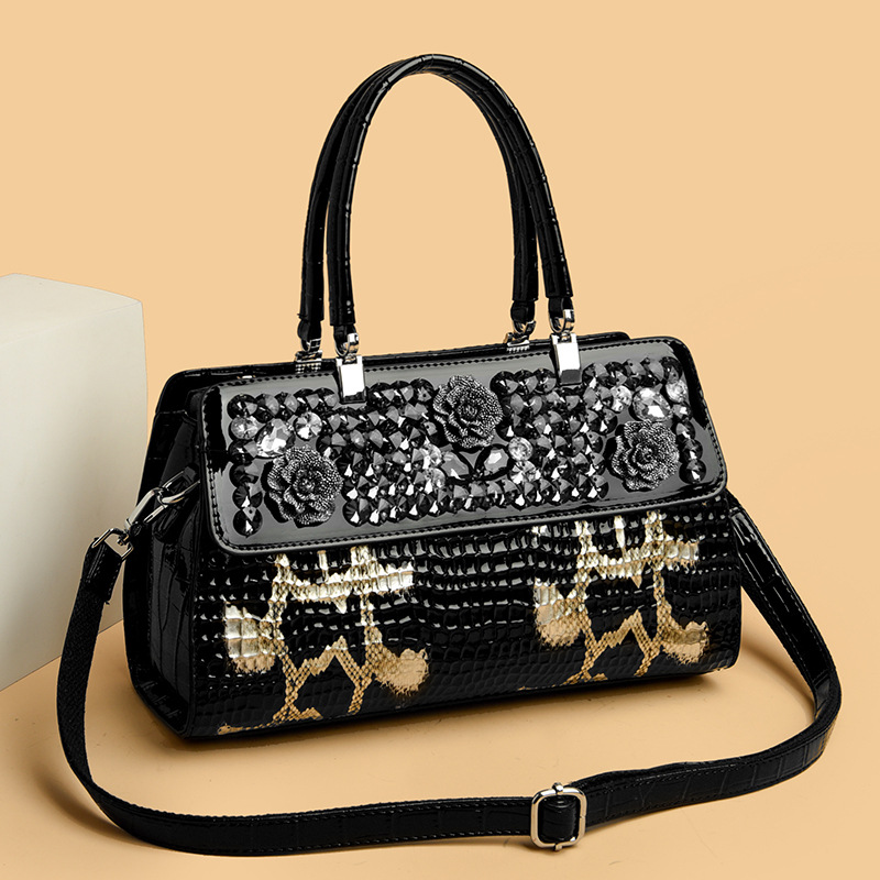 Temperamento transfronterizo lujoso ligero nicho negro relieve de moda universal atmósfera bolso de hombro de cocodrilo bolso de madre