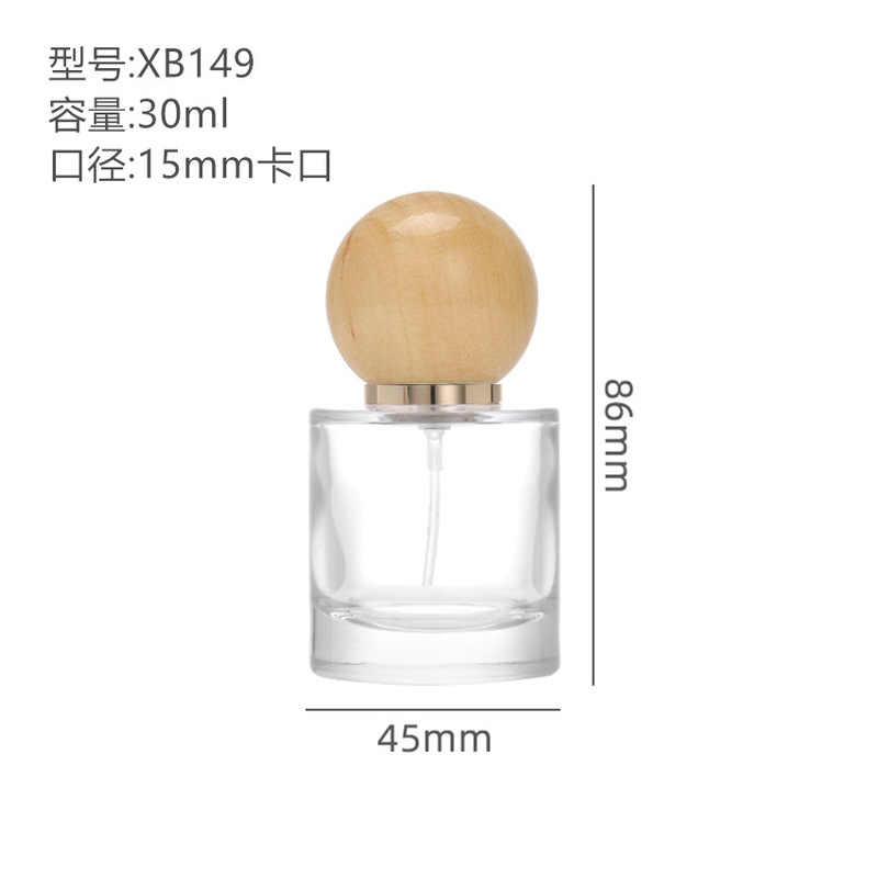 工場現物卸売り15バヨネット円柱プッシュ式透明香水細霧噴霧ガラス瓶はハスの木のボールカバーを含んでいる|undefined
