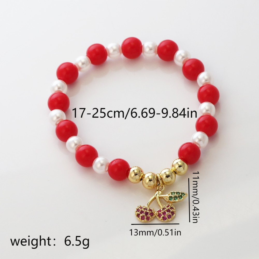 Pulsera con labios, perla y fresa esmaltados