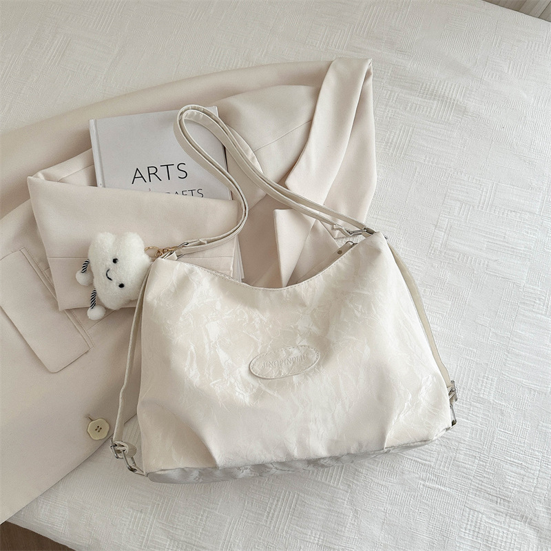 Bolsa de sensación relajada, bolsa de mujer, gran capacidad de verano, 2024, nueva bolsa de viaje de hombro de un solo tipo