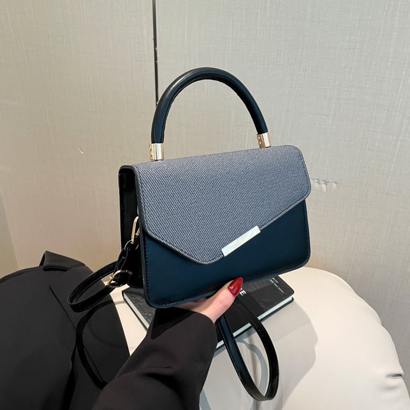 Bolso de mujer transfronterizo 2025 nuevo bolso de mujer ligero de lujo empalme estilo estilo de moda texturas de color bolso de mano