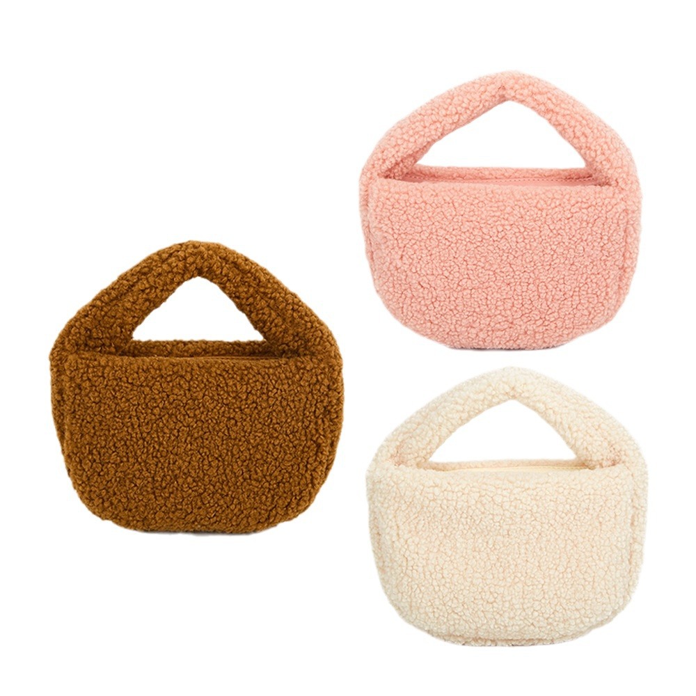 2025 otoño e invierno nuevo estilo de alta gama bolso femenino de felpa color caramelo bolso de mano de moda bolso de lana bolso de piel bolso de lingote