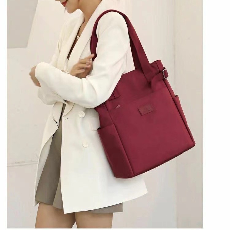 Nuevo bolso de lona, bolso de tela de nailon, bolso informal japonés transfronterizo de gran capacidad con múltiples bolsillos