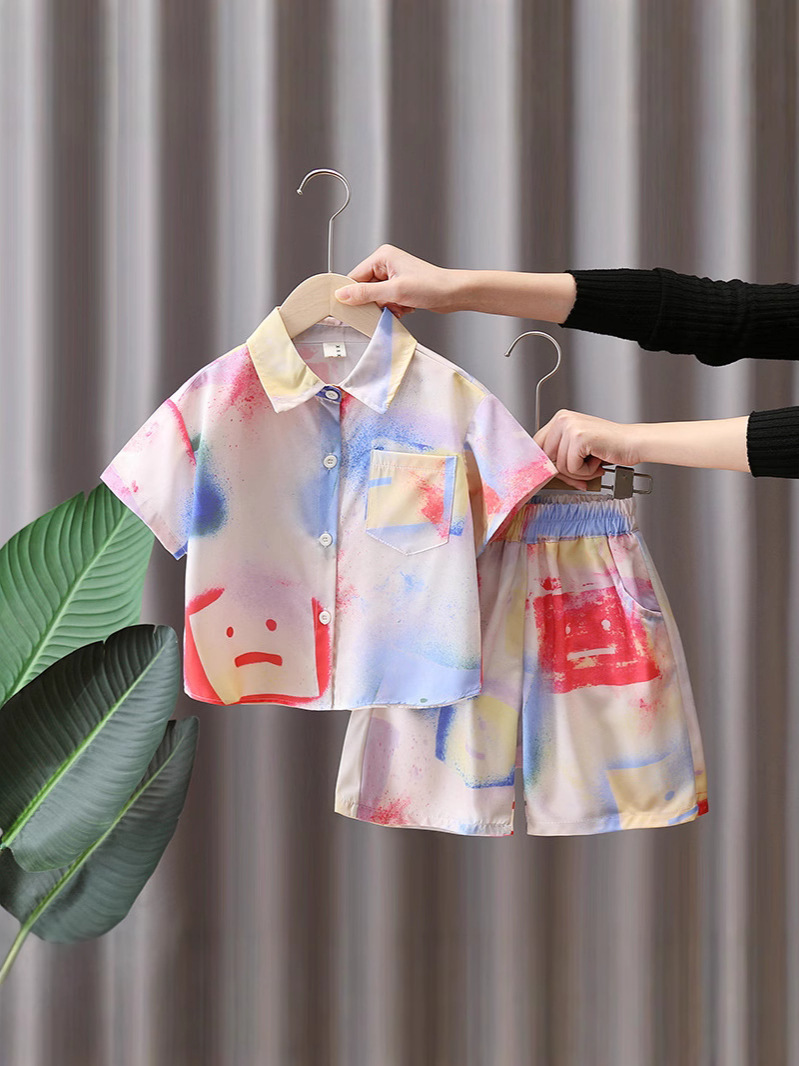 7180 Traje de verano para niños 2025 Nuevo estilo Camisa de flores rufián Ropa de playa Traje de tres piezas de manga corta de verano para niños