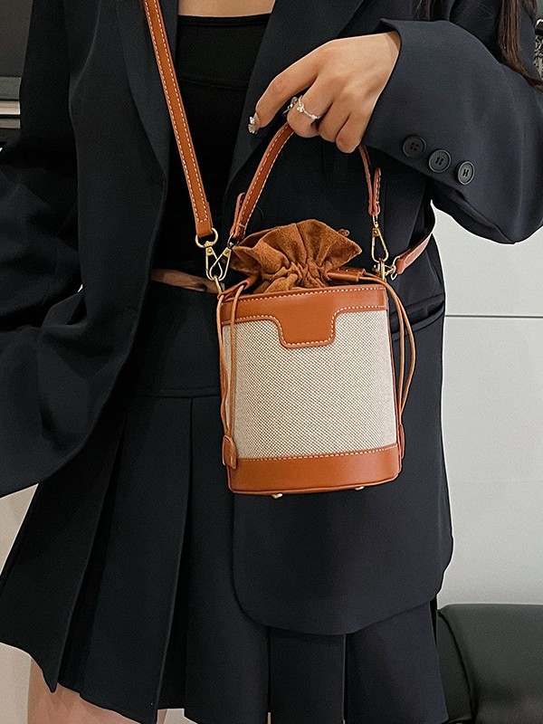 Bolso de mano cilíndrico de color contrastante para mujer, novedad 2026, estilo transfronterizo del Sudeste Asiático, a la moda, bandolera de un solo hombro