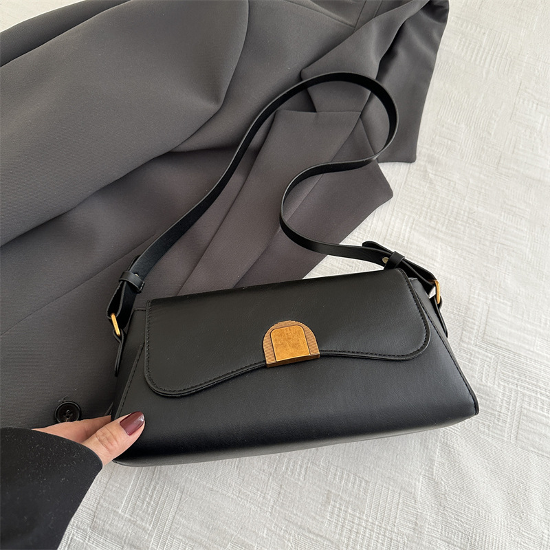 Bolso de brazo retro de palo para mujeres 2025 nuevo nicho de moda de alta sensación bolso de hombro universal bolso de mochila