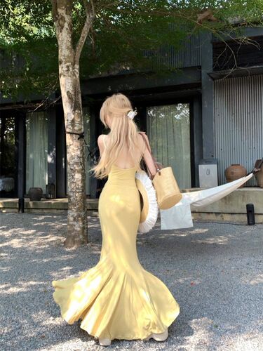 Charming and alluring maxi dress with off-shoulder design, perfect for summer, featuring a stylish French seaside vacation vibe, featuring a fishtail silhouette and a fish-shaped, flattering fit-and-flare design.