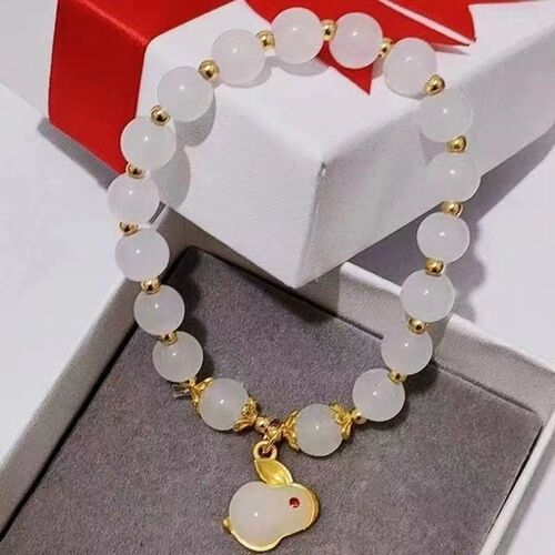 New style national trend and Hetian jade Fu fortune rabbit bracelet for girls, ancient style zodiac rabbit, popular hand tie with red bean agate.