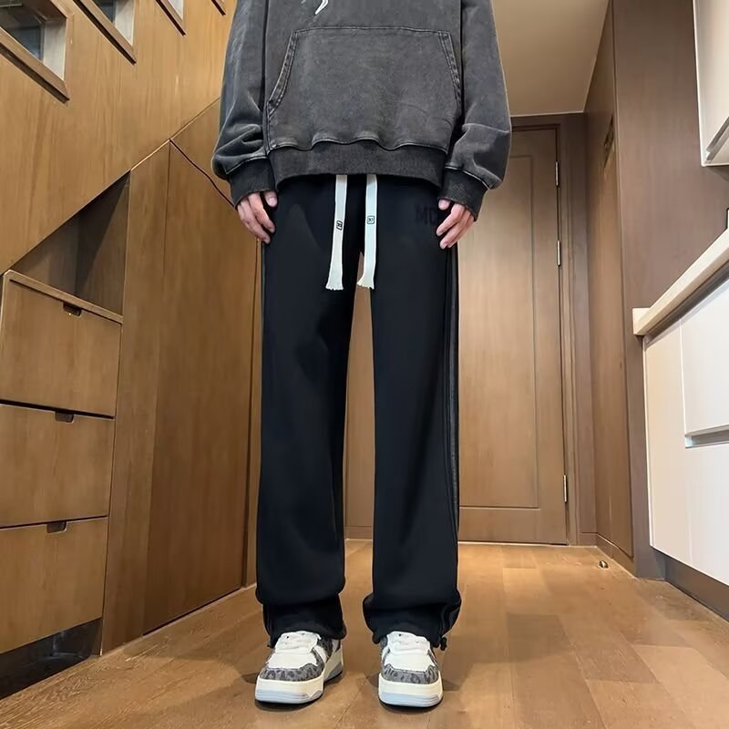 中学生向けの春と秋のパンツ、ハンサムなカジュアルパンツ、ティーンエイジャー向けのルーズストレートパンツ、多用途のスポーツパンツ|undefined