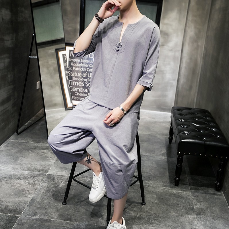 2023 traje casual para hombre estilo chino moda suelta hebilla de disco manga corta camiseta bombachos de dos piezas de algodón y lino al por mayor