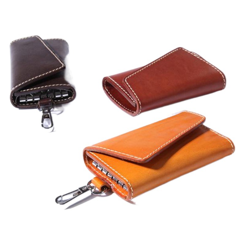 2026年新作レザーキーバッグ、クロスボーダー仕様のステッチ入り牛革車キーバッグ、カジュアルな本革キーホルダー「ジンガ」