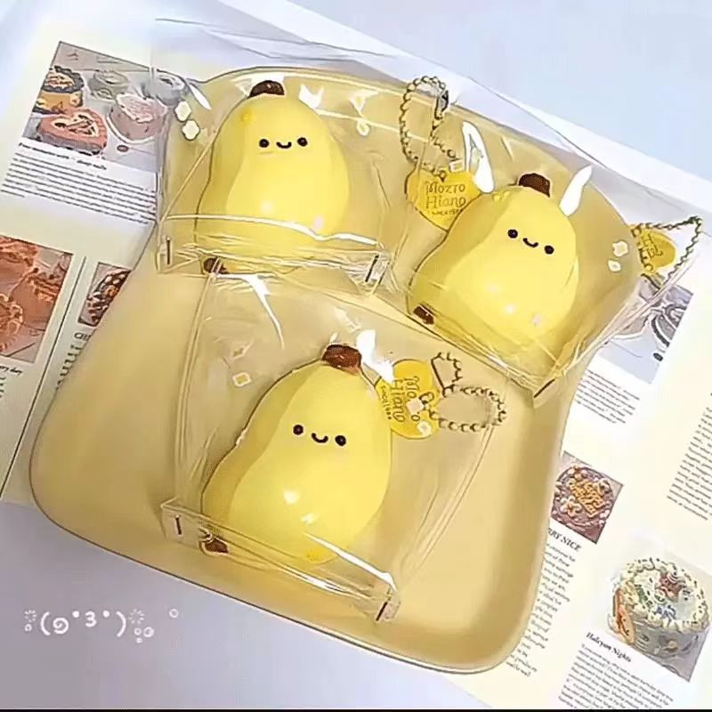 Pequeño libro rojo con el mismo plátano graso pellizco pellizco simulación de juguetes de descompresión de alto valor facial extrañamente lindo caja ciega bolsa ciega