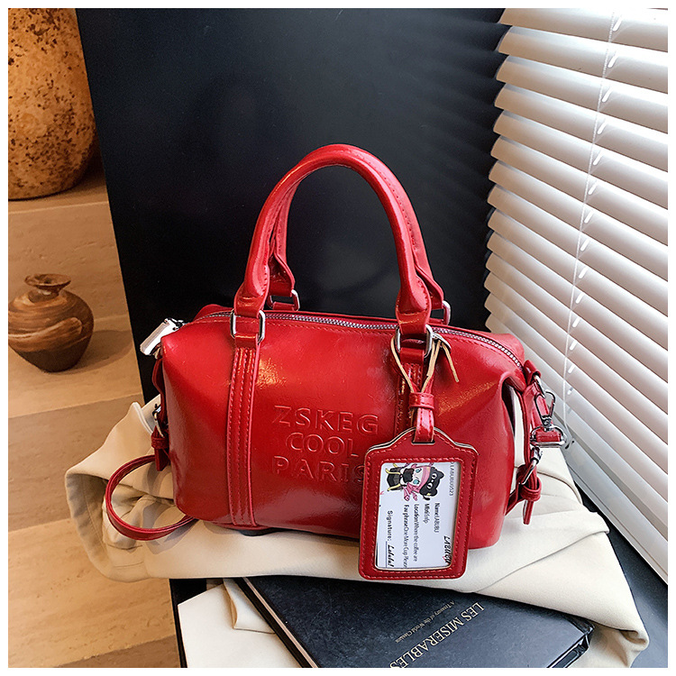 Korean version hand-held bowling bag for women 2025 new retro niche commuting pillow bag versatile single-shoulder crossbody bag undefined