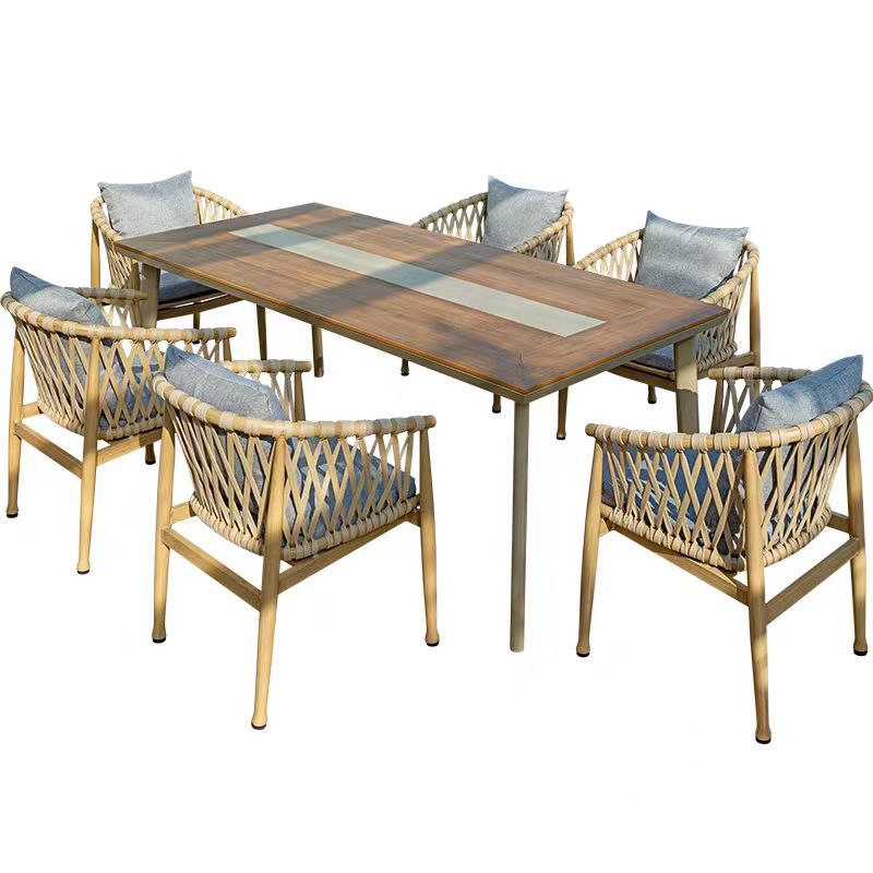 Mesas y sillas de comedor de balcón al aire libre nórdico Patio de la villa Sala de sol Jardín del hotel Recreación al aire libre Cuerda de ocio Muebles de silla de ratán